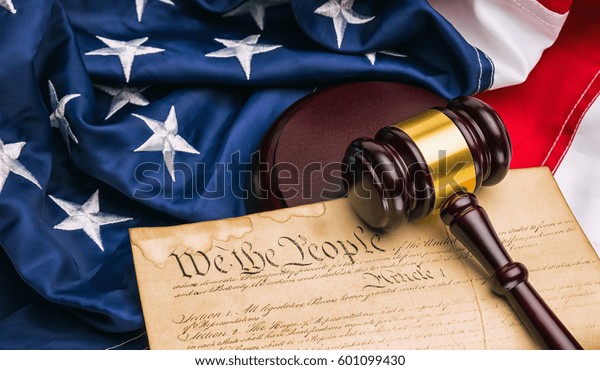 American Constitution - We the people with USA Flag\
and judge gavel