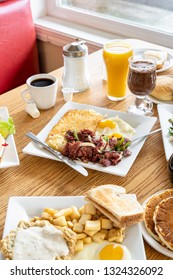 American Diner Food Served At Truck Stop Restaurant. Stopping For Breakfast At A Greasy Spoon Restaurant. 