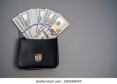 American dollar banknotes stack, pack of money in black bag, rich, luxury, currency, spending money in crisis, benchmark currency, most used in transactions across the world, corruption  