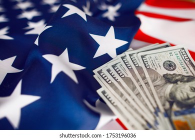 American Dollar Cash Money on American flag background.