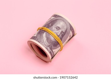 American Dollars On A Pink Background. American Rescue Plan, USA Relief Program, Stimulus Check, Act Of 2021 Concept. Money, Business, Profit And Livelihood Idea