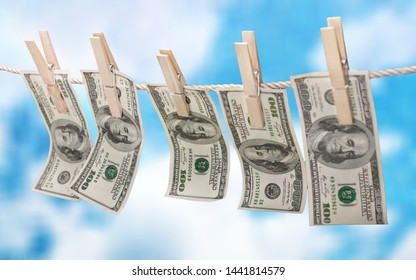 American dollars in a rope on background