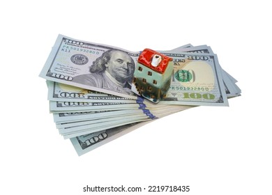 American Dollars And Small House Isolated On White Background. US Currency.