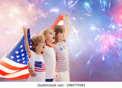 American Family Celebrating 4th Of July. People Watching Independence Day Fireworks Holding US Flag. Proud USA Kids Cheer And Celebrate. Child With America Symbol. National Holiday Party.