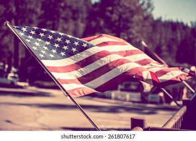 American Flag. 4th Of July City Decoration. Vintage Grading.