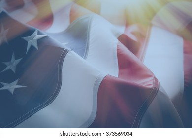 American flag background with sunlight - Shutterstock ID 373569034