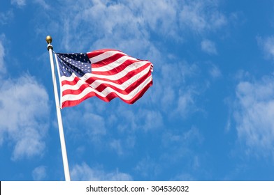 American Flag With Beautiful Sky Background