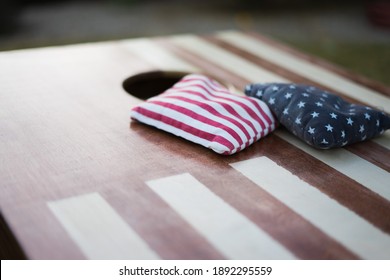 American Flag cornhole boards with bean bags with focus on the bean bags