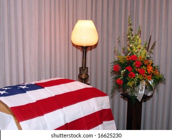 American Flag Draped Over A Casket Of A War Veteran