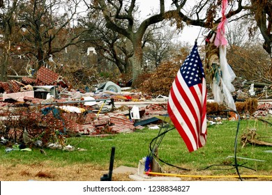 American Flag Flies Amid Hurricane Damaged Debris