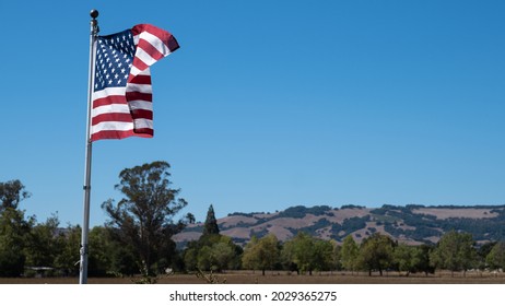 American flag floating in the sky of California