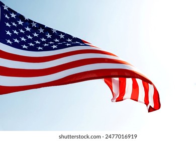 American flag is flying in the air. - Powered by Shutterstock