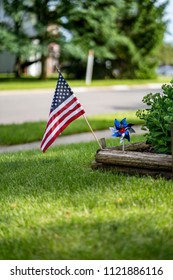 American Flag In Front Yard Garden