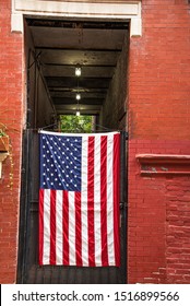 An American flag hang in a residential entrance