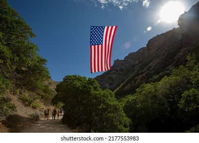 American Flag Hanging Over Mountain Valley Stock Photo 2177553983 ...