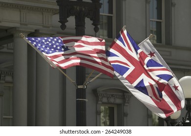 American Flag Hanging With Union Jack British Flag Next To The White House, Washington, DC, Symbolizing The Special Relationship Between England And America.