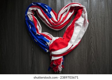 American flag in heart shape on wooden floor. American flag for Memorial Day, 4th of July or Labour Day - Powered by Shutterstock