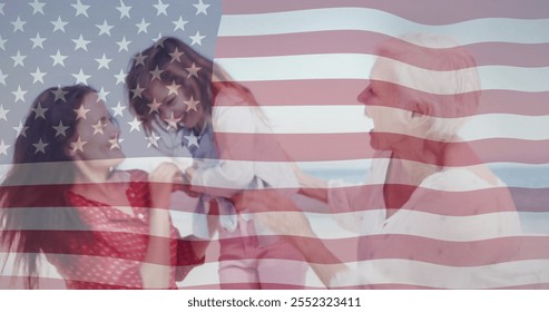 American flag image over people interacting on beach. Patriotism, national, summer, ocean, coast, family - Powered by Shutterstock