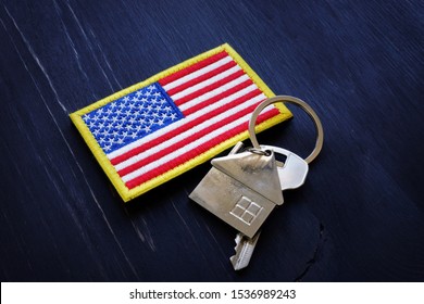 American flag and key from home. VA Streamline Refinance loan concept.