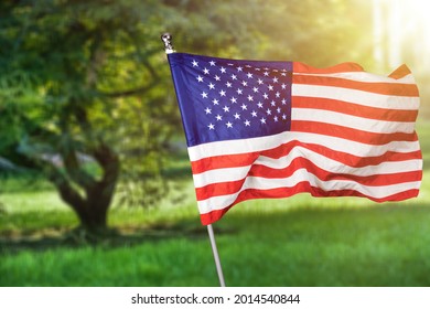 American flag for Memorial Day, 4th of July, Independence Day on the outdoor background. - Shutterstock ID 2014540844
