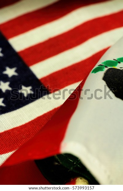 american flag  and mexican flag go to battle over\
the wall/ america and mexico divided over building the wall/\
divided we stand.