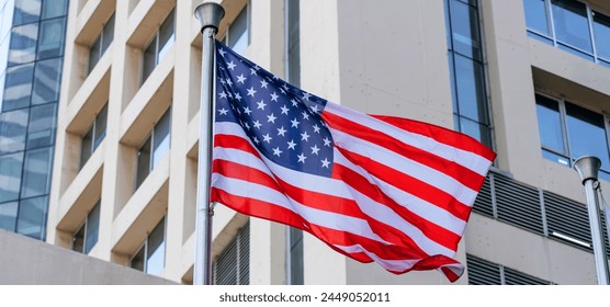 American flag and Modern buildings in the metropolis wide panoramic. - Powered by Shutterstock