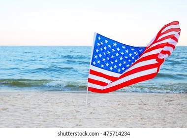 American Flag On Beach