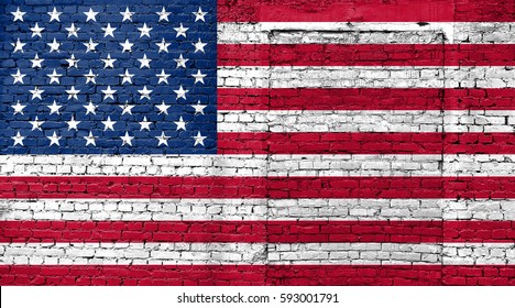 American flag on brick wall with bricked door