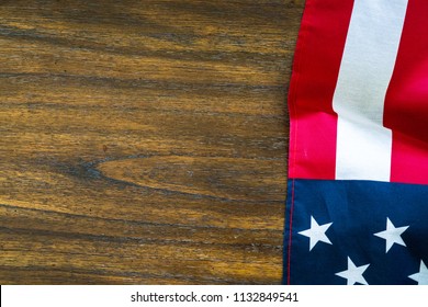 American Flag On The Side Of A Wood Grain Background Lay Flat Looking Down From Above Patriotic View Of National Flag Screensaver Back Drop American Pride