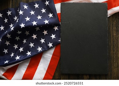 American Flag on Wooden Table with Blank Slate for Text - Powered by Shutterstock