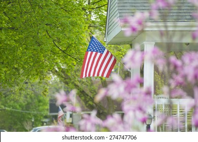 An American flag out in the spring time.