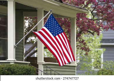 An American flag out in the spring time.