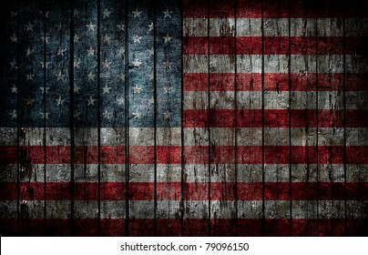 American flag painted on fence background.