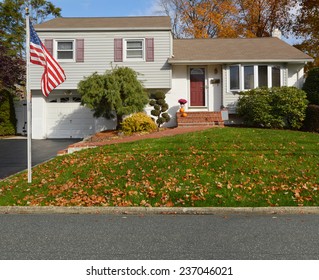 American Flag Pole Suburban High Ranch House Autumn Day Residential Neighborhood USA