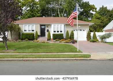 American Flag Pole Suburban Ranch House Bay Window Flowers Residential Neighborhood USA