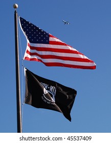 American Flag With POW Flag And Airplane