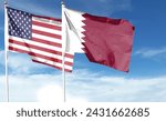 American flag and Qatar flag on cloudy sky. fly in the sky