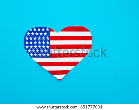 American flag in the shape of a heart on bright yellow background, USA, independence day
