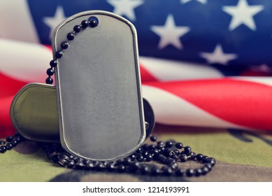 American flag and soldiers badges.Veterans Day Concept. - Powered by Shutterstock