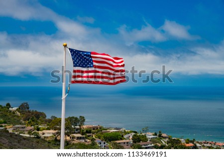 American Flag Swinging Beautiful Ocean View Stock Photo