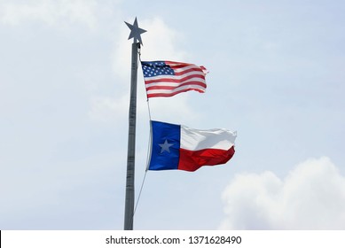 American Flag And Texas Flag Flying