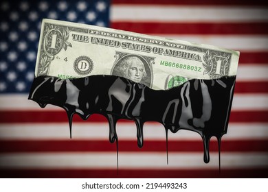 American Flag With US Dollar Bill Dripping With Crude Oil Showing The High Cost Of Gas At The Pump Or The USA Dependency On Fossil Fuels.