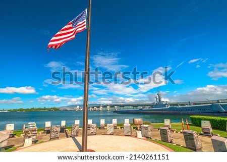 American flag with the USS Bowfin Submarine SS-287. Pearl Harbor historic landmark, National historic and patriotic landmark memorial of the Japanese attack in world war 2.