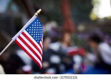 American Flag Waving With Blurred Background People Celebrating Independence Day 4th Of July