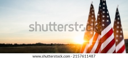 American flag waving in the sunrise.American flag for Memorial Day,4th of July,Labour Day.Independence Day concept.