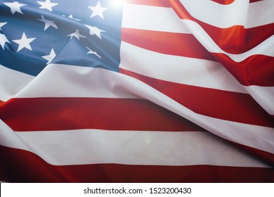 American flag waving in the wind. Flag USA as a patriotic background - Shutterstock ID 1523200430