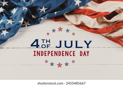 American flags against white wooden background. Flat lay with copy space, Happy Independence Day, July 4. - Powered by Shutterstock