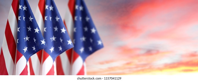 American flags in bright sky