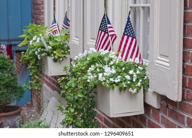 American flags in a flower pot for the 4th of July Celebration