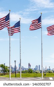 American flags in state park with Manhattan view